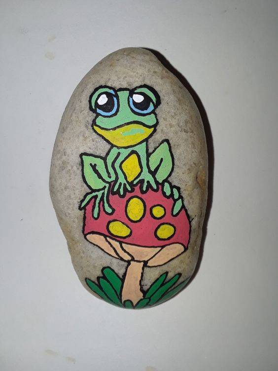 幼儿园手工彩色石头画-卡通青蛙作品图片精选_3