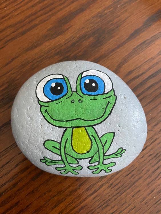 幼儿园手工彩色石头画-卡通青蛙作品图片精选_1