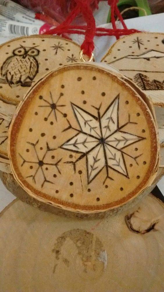 幼儿园雪花木片画作品图片大全_7