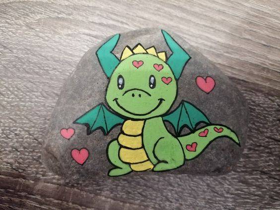 幼儿园卡通绿色小恐龙石头画作品图片精选_2