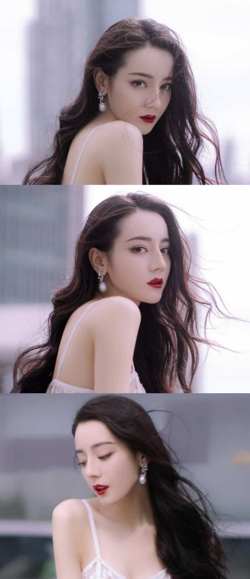 迪丽热巴白色低胸镂空蕾丝透视装羽毛长裙高清图片_6