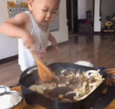 Little baby boy cooking stir-fry  Funny GIF_1