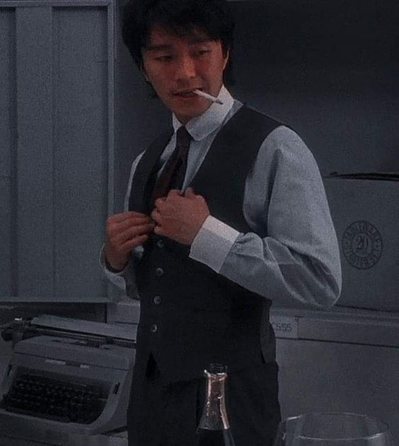 周星驰电影中抽烟经典镜头图片_5